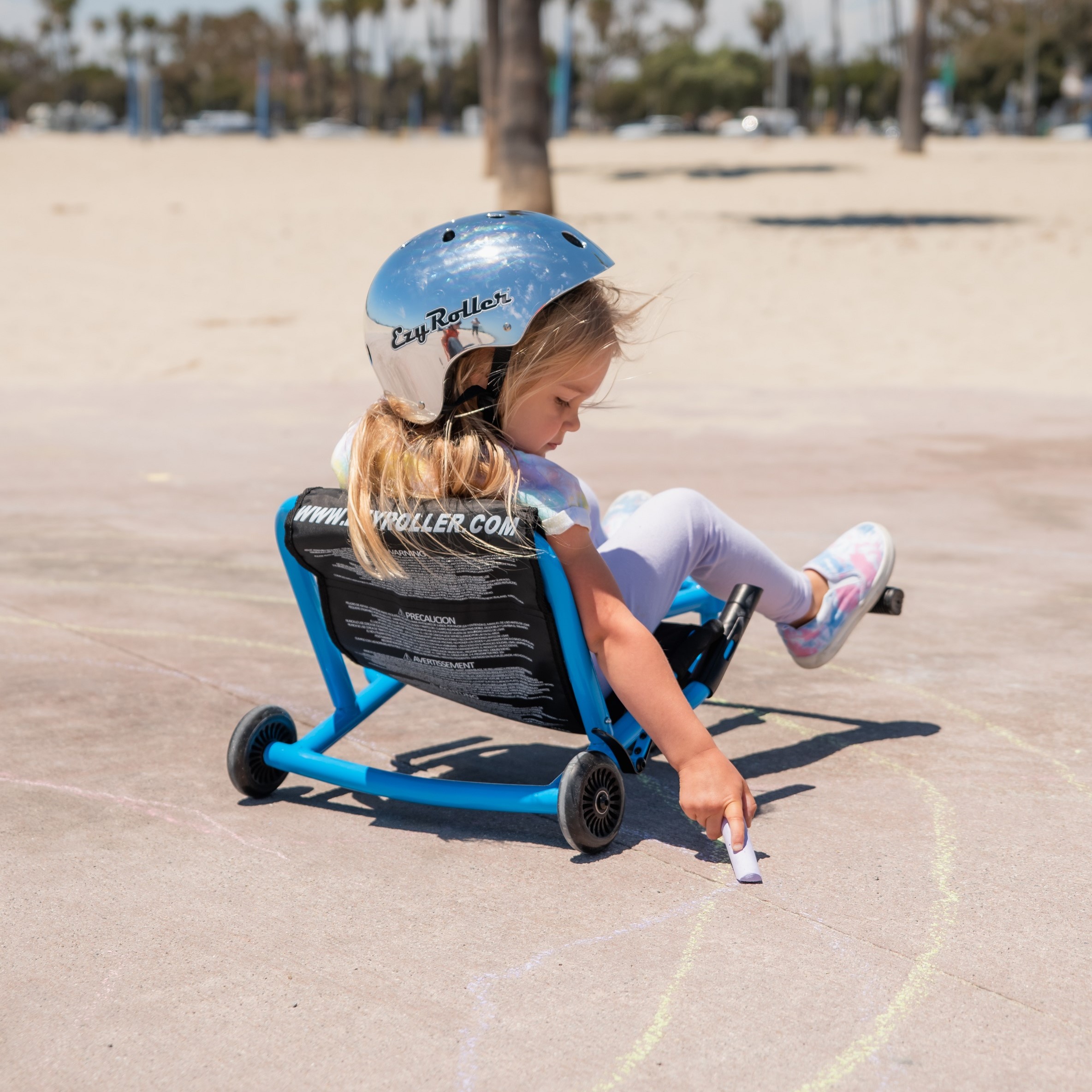 girl writing with chalk sqaure